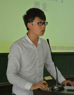 3社团联合会主席周文浩发言 罗格言摄.jpg